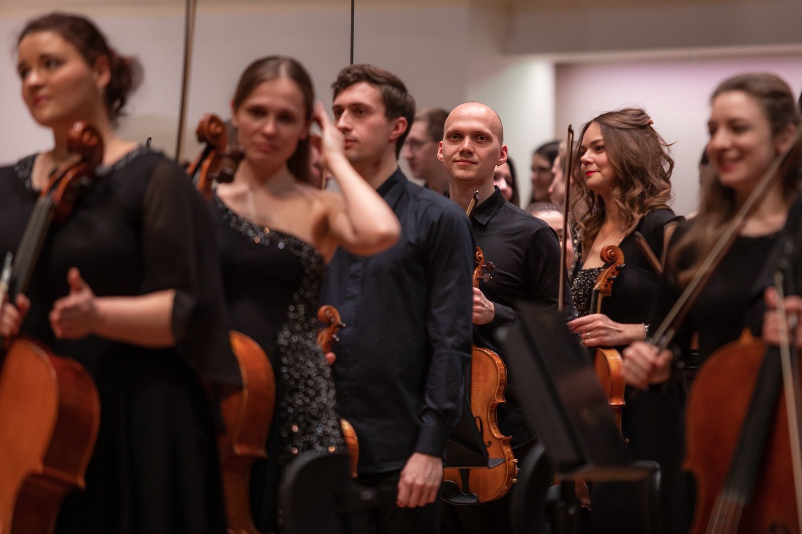 Musicians on stage after a symphony concert