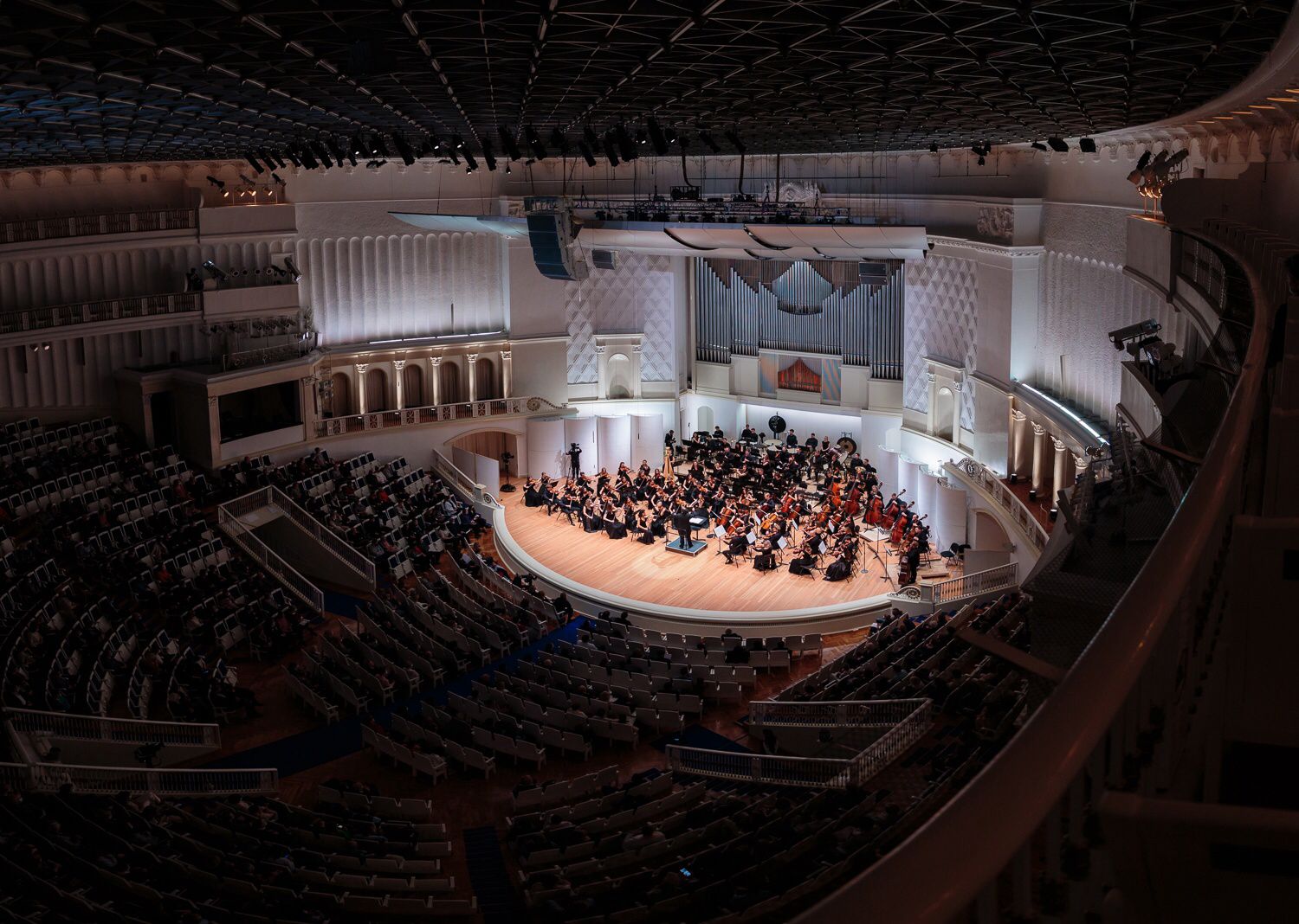 Orchestra performing in a concert hall